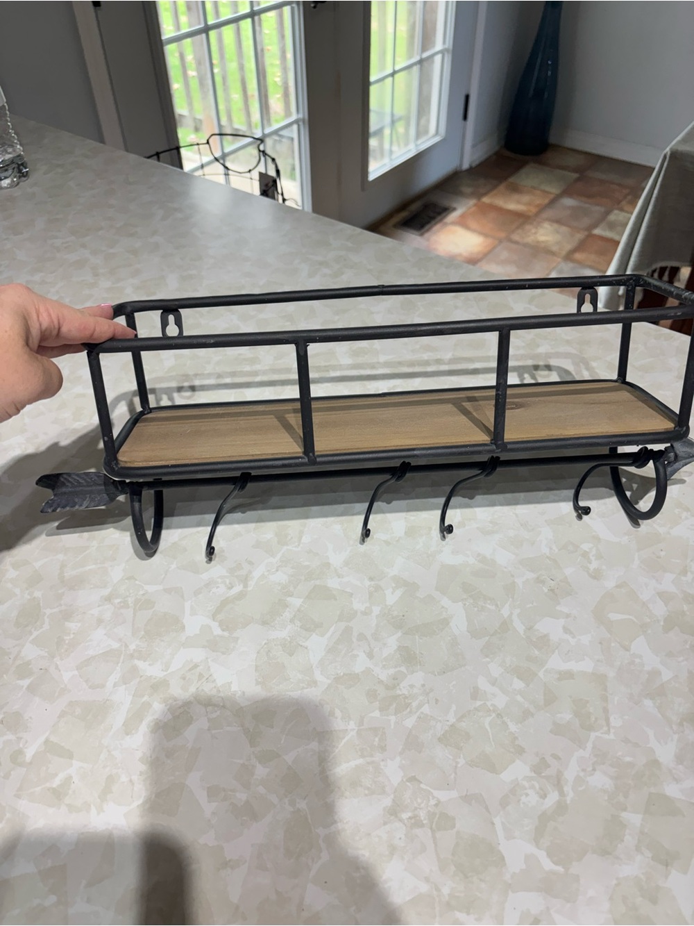 Rustic Black Metal Wall Shelf with Hooks and Wood Accent